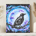 A vertical art print featuring a black raven perched on a branch in front of a glowing blue and purple moon, displayed on a shelf between two white vases with dried grass.