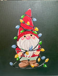Winter Gnome wrapped in lights
